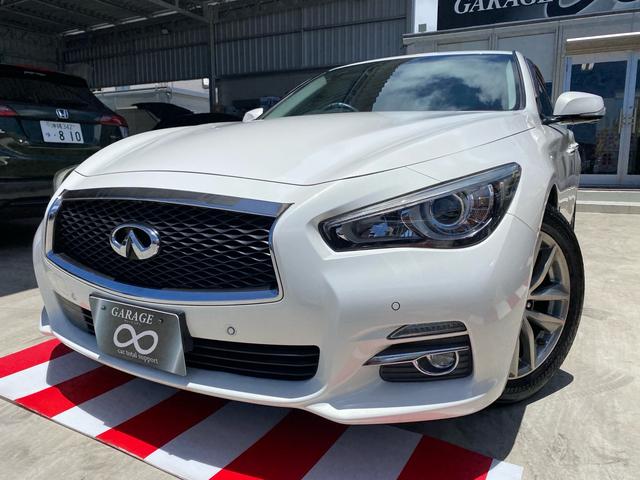沖縄県の中古車ならスカイライン ３５０ＧＴ　ハイブリッド　タイプＰ　ブラックレザーシート　メモリーパワーシート　クリアランスソナー　ＬＥＤライト　ステアリングスイッチ　ナビ　ＴＶ　Ｂｌｕｅｔｏｏｔｈ　バックカメラ　アラウンドビューモニター　本土仕入れ　２４ヶ月保証付き
